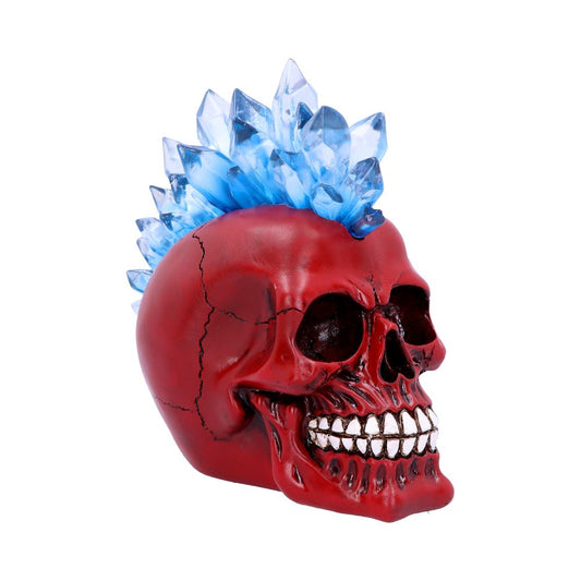 A shiny red skull sits on a white background. It features a mohawk that is light blue and has been made to look like crystal shards. The jaw is clenched with white teeth on display and the eyes and nose sockets are hollwed out.