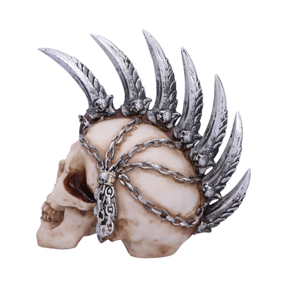 A side view of a skull which has a metallic mohawk. There are 7 spikes all of which have little skulls sitting between them. There are 5 chains coming off of the mohawk that go down the side of the skull and join into a linked chain at the bottom.