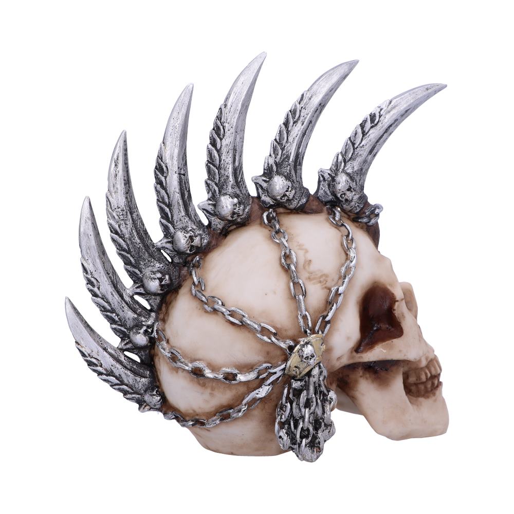 A natural coloured skull is on a plain background. This shows the right side of the item which features a metallic mohawk with blades embellished with metal skulls. The blades look to be held together by chains that are strapped together over the side of the skull.