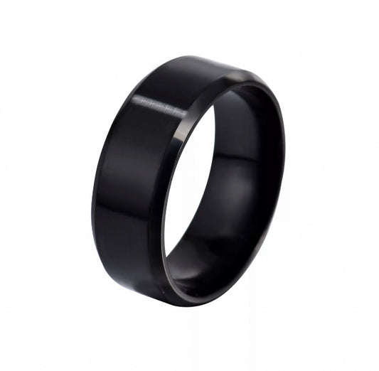 A black banded ring sits on a plain white background. It is shiny in appearance with the light glistening off of it. It is a plain band which is solid to feel but lightweight.