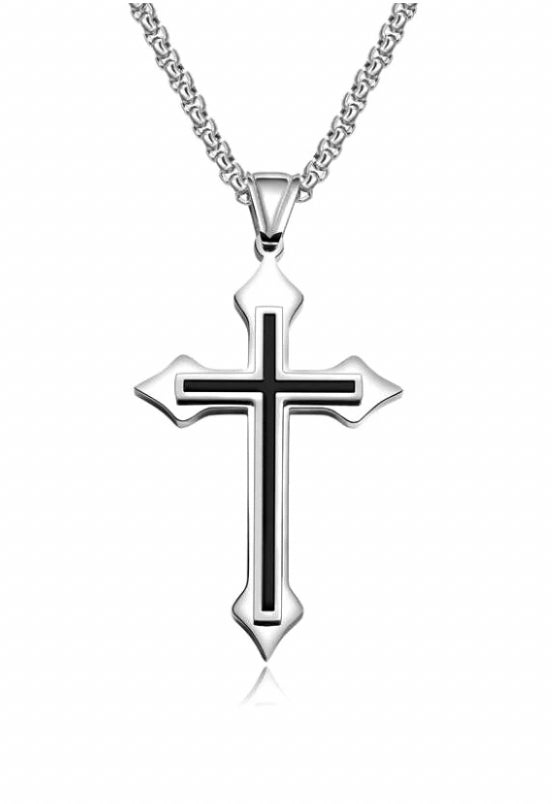 A silver colour cross pendant is attached to a chain of the same colour. On top of the cross in another smaller one but in black giving it a contrast.