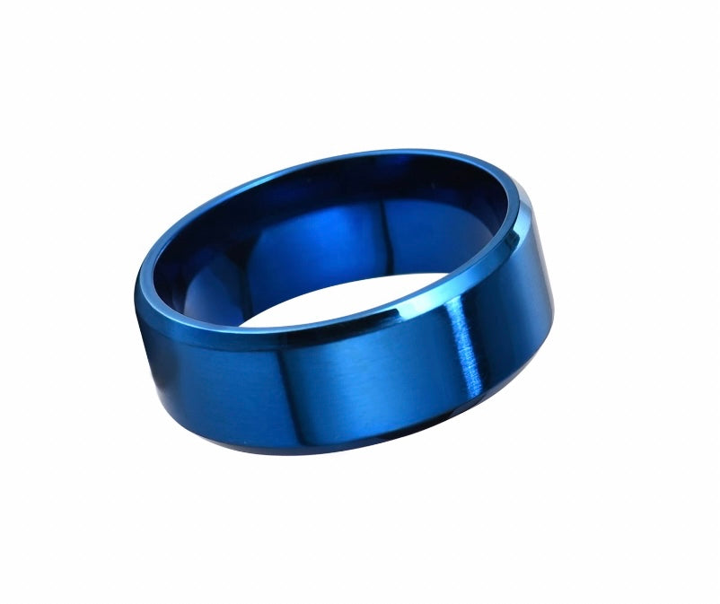 A blue coloured ring that is a plain band and is smooth to the touch. It is lightweight to hold and wear but solid as the same time.