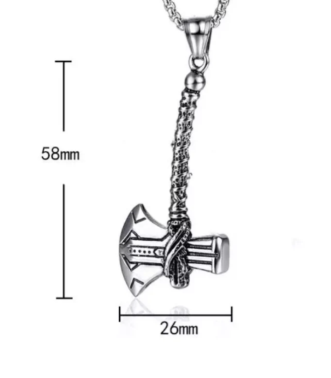 A white plain background shows a scale of a long handled axe pendant which is silver in colour and made of stainless steel. This states the size of the axe as being 58mm in length and 26mm in width. 