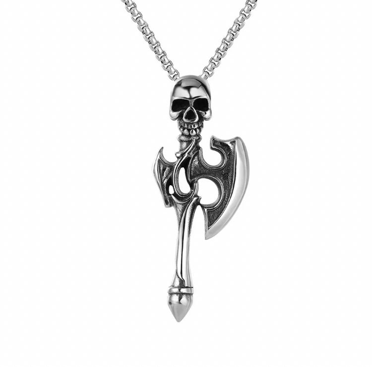 On a white background hangs a chunky pendant which is a skull attached to a axe blade. Silver in colour there is also a sturdy looking chain.